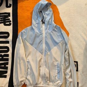 Baby blue and white windbreaker